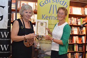 Ann Preston-Jones (right) receives the Holyer an Gof Cup from Maureen Fuller, the Grand Bard of Gorsedd Kernow